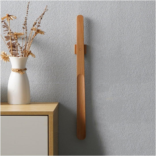 StepNord™ – Elegant vægmonteret skohorn i træ